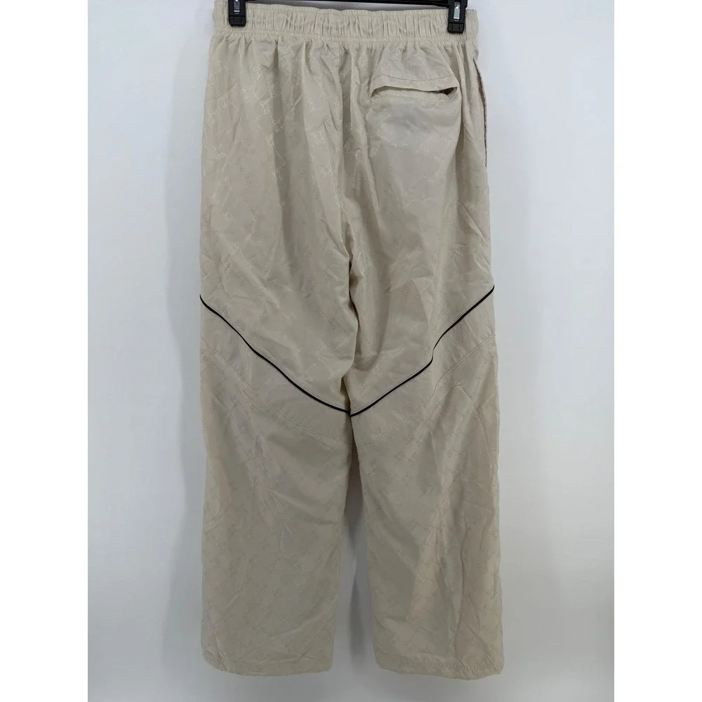 Nike Jordan Jumpman AOP Track Pants Mens M Beige Cream Wide Leg Adjustable Hem‎